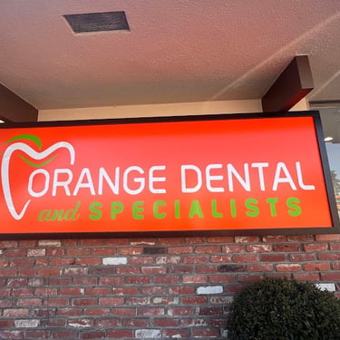 Orange Dental and Specialists neon sign